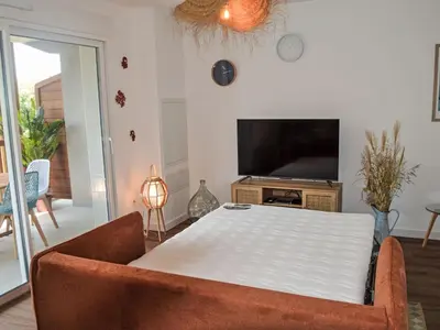 Télévision ou salle de divertissement dans l'établissement Apartment Jade et Elena-2 by Interhome