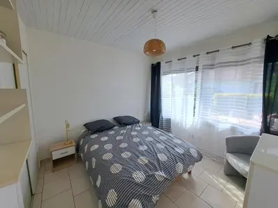 Un ou plusieurs lits dans un hébergement de l'établissement Cottage au cœur des Landes