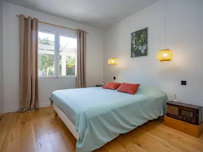 Un ou plusieurs lits dans un hébergement de l'établissement Villa Rénovée à Hossegor avec Piscine Chauffée, Proche Golf et Plage - FR-1-791-15