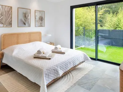 Un ou plusieurs lits dans un hébergement de l'établissement Villa de Luxe à Seignosse: Golf, Piscine Chauffée, Proche Plages - FR-1-791-25