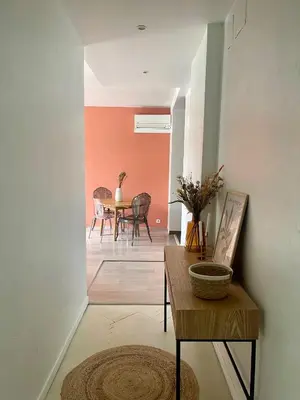 Coin salon dans l'établissement Grand T3 très lumineux, à 2min à pied de la gare