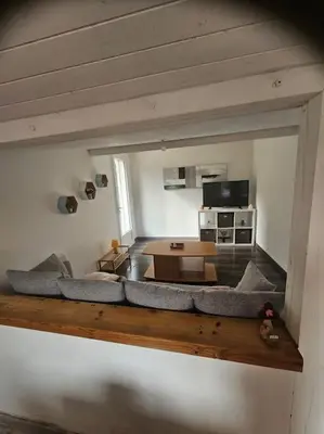 Coin salon dans l'établissement la chêneraie appart écureuil