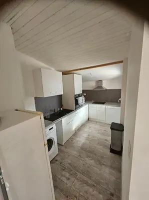 Cuisine ou kitchenette dans l'établissement la chêneraie appart écureuil