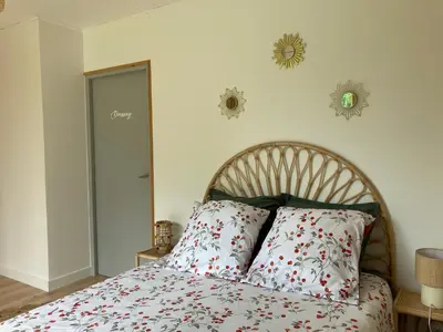Un ou plusieurs lits dans un hébergement de l'établissement Gîte La Grange de Pardies Classé 2 étoiles