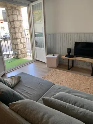 Télévision ou salle de divertissement dans l'établissement Rue de la paix