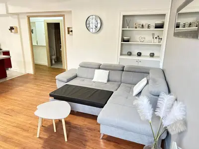 Coin salon dans l'établissement Appartement au centre ville