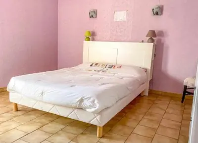 Un ou plusieurs lits dans un hébergement de l'établissement Le Balcon bleu de Biscarrosse
