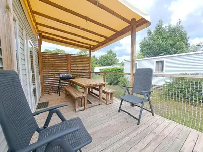 Balcon ou terrasse dans l'établissement HARMONIE Mobil home au cœur d'un camping 5 étoiles