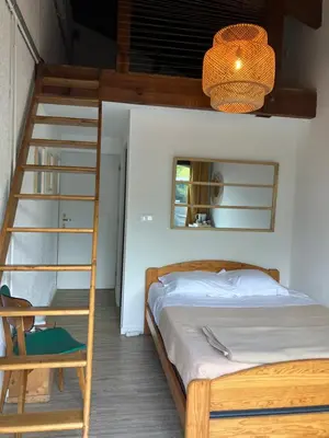 Un ou plusieurs lits dans un hébergement de l'établissement Chambre et sdb avec entrée privative