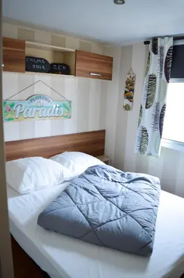 Un ou plusieurs lits dans un hébergement de l'établissement Mobil-home Mick et Stefie