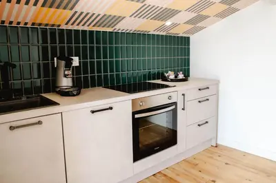 Cuisine ou kitchenette dans l'établissement Maison Castor, balnéo et billard chez Ivona Vacances