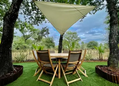 Jardin de l'établissement Mobilhome 212 6 couchages camping 4 étoiles