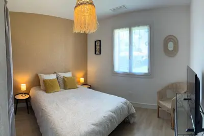 Un ou plusieurs lits dans un hébergement de l'établissement Maison de vacances