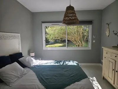 Un ou plusieurs lits dans un hébergement de l'établissement Chambre d'hôtes Landes - Le Clos des Oliviers