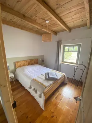 Un ou plusieurs lits dans un hébergement de l'établissement Maison de Campagne avec Piscine