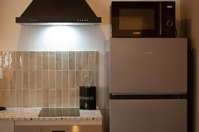 Cuisine ou kitchenette dans l'établissement Le Zénith - Un havre de paix à Dax