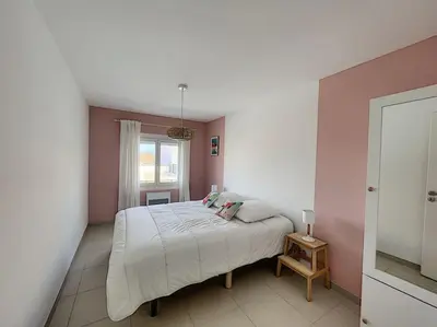 Un ou plusieurs lits dans un hébergement de l'établissement Agréable 3 chambres extra centre à 200m de l'océan