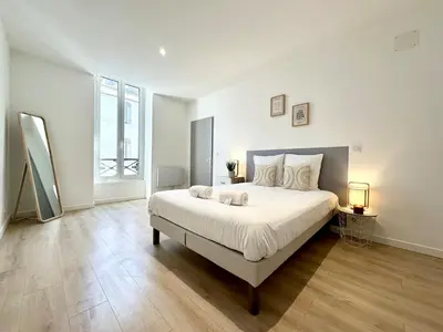 Un ou plusieurs lits dans un hébergement de l'établissement Le Repaire du Cow-boy - Spacieux - Central - Cosy