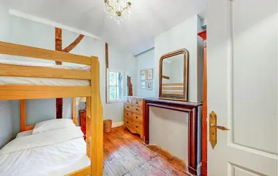 Un ou plusieurs lits dans un hébergement de l'établissement Nice Home In Montgaillard
