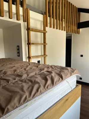 Un ou plusieurs lits dans un hébergement de l'établissement Chalet Landais