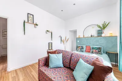 Coin salon dans l'établissement Appartement cosy tout équipé