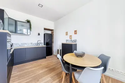 Cuisine ou kitchenette dans l'établissement Appartement cosy tout équipé