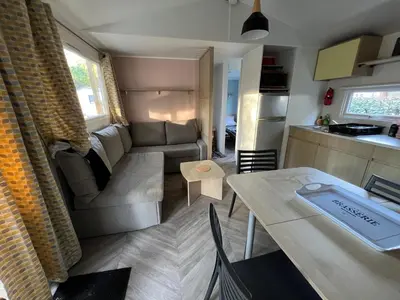 Un ou plusieurs lits dans un hébergement de l'établissement mobilhome 4 étoiles