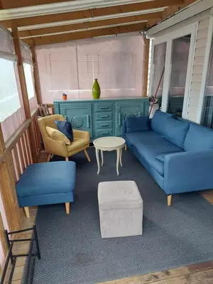 Coin salon dans l'établissement Mobilhome climatisé 6 pers