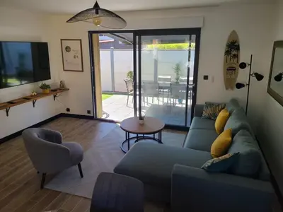Coin salon dans l'établissement Maison avec piscine Pyla sur mer