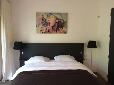Un ou plusieurs lits dans un hébergement de l'établissement Villa AMANJANGO SEIGNOSSE-HOSSEGOR