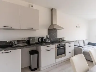 Cuisine ou kitchenette dans l'établissement Appartement 4 pers. centre Mimizan, neuf avec parking - FR-1-50-143