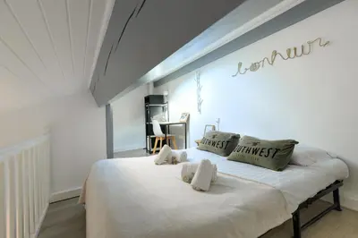 Un ou plusieurs lits dans un hébergement de l'établissement Maison Kabâna - Welkeys