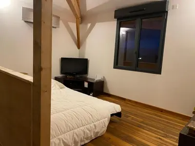 Télévision ou salle de divertissement dans l'établissement Villa Harmonie