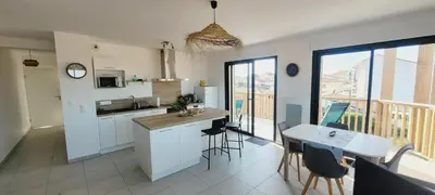 Cuisine ou kitchenette dans l'établissement Le ricochet