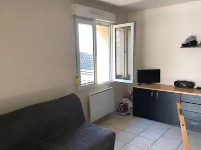 Télévision ou salle de divertissement dans l'établissement appartement la teste centre