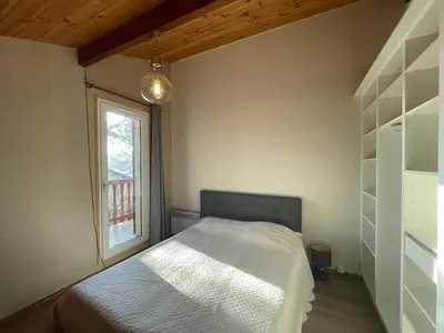 Un ou plusieurs lits dans un hébergement de l'établissement Duplex spacieux 8 pers avec terrasse et parking, Capbreton - FR-1-413-249