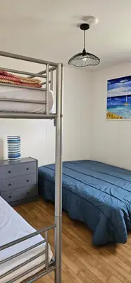 Un ou plusieurs lits dans un hébergement de l'établissement Villa Maëlyssia - Les villas du lac