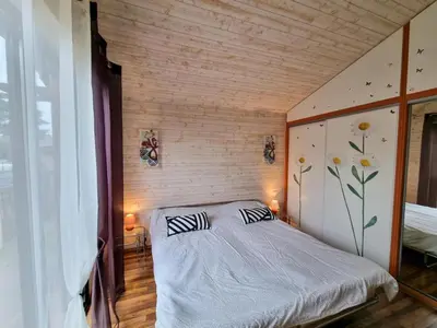 Un ou plusieurs lits dans un hébergement de l'établissement La maison des glycines