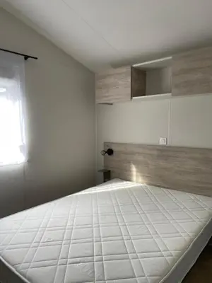 Un ou plusieurs lits dans un hébergement de l'établissement Mobilhome