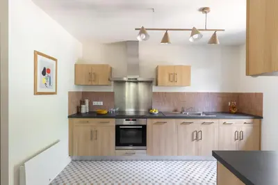 Cuisine ou kitchenette dans l'établissement Villa Xara au coeur du Moulleau PYLA SUR MER