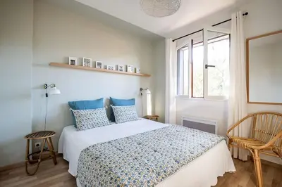 Un ou plusieurs lits dans un hébergement de l'établissement Villa Fougères à deux pas de la plage PYLA SUR MER