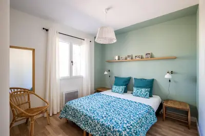Un ou plusieurs lits dans un hébergement de l'établissement Villa Dahlia à deux pas de la plage PYLA SUR MER