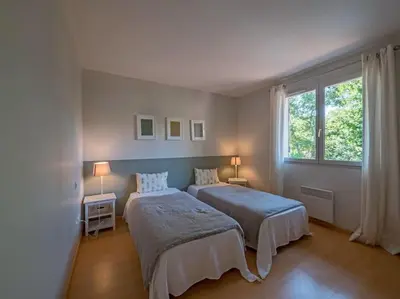 Un ou plusieurs lits dans un hébergement de l'établissement Villa Les Pins à deux pas de la plage PYLA SUR MER