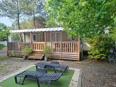 Jardin de l'établissement Mobil home 8 personnes 3 chambres