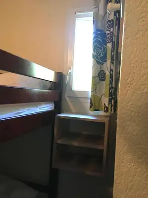 Un ou plusieurs lits dans un hébergement de l'établissement appartement soustons plage
