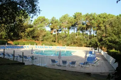 Piscine de l'établissement appartement soustons plage ou située à proximité