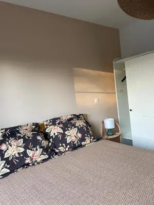 Un ou plusieurs lits dans un hébergement de l'établissement Charmante chambre chez l habitant