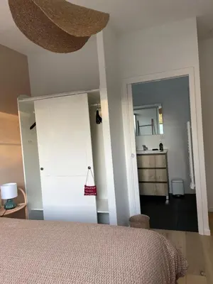 Un ou plusieurs lits dans un hébergement de l'établissement Charmante chambre chez l habitant