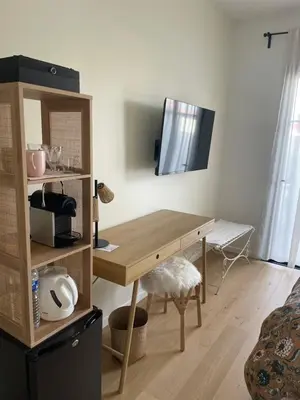 Télévision ou salle de divertissement dans l'établissement Charmante chambre chez l habitant