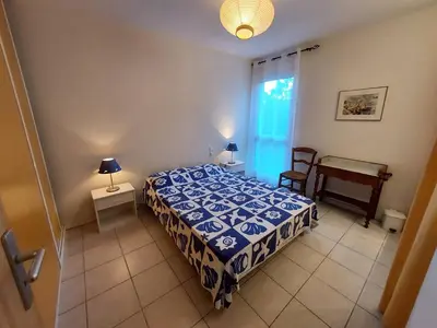 Un ou plusieurs lits dans un hébergement de l'établissement Villa PERICA pour 10 personnes. Entre lac et océan. Wifi gratuit.